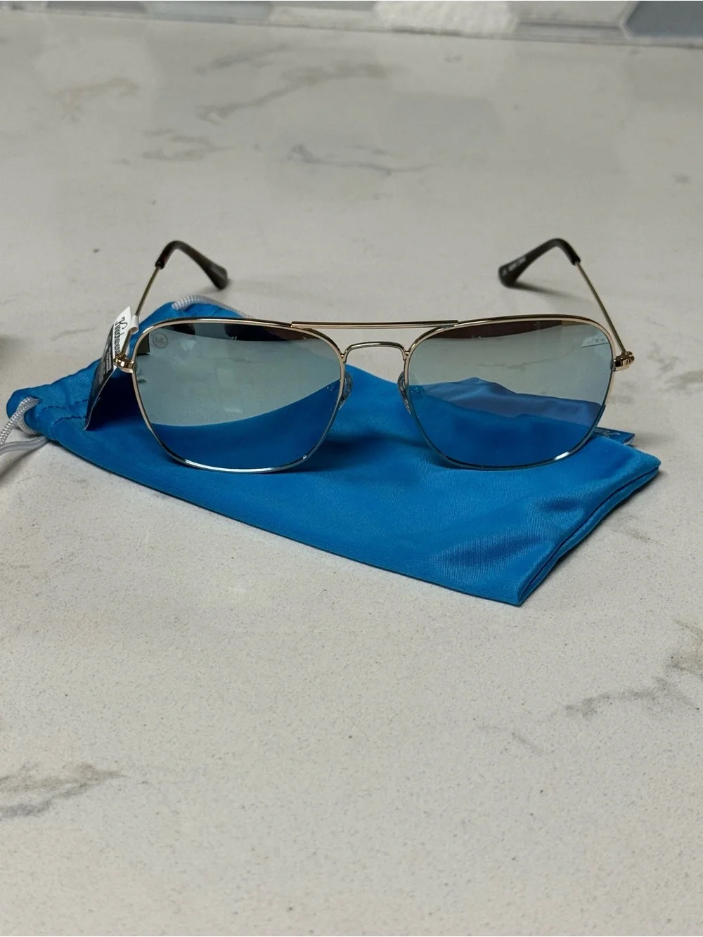 Mount Evans Gold Frame Sunglasses with Sky Blue Lenses